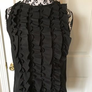 Ruffled sleeveless blouse